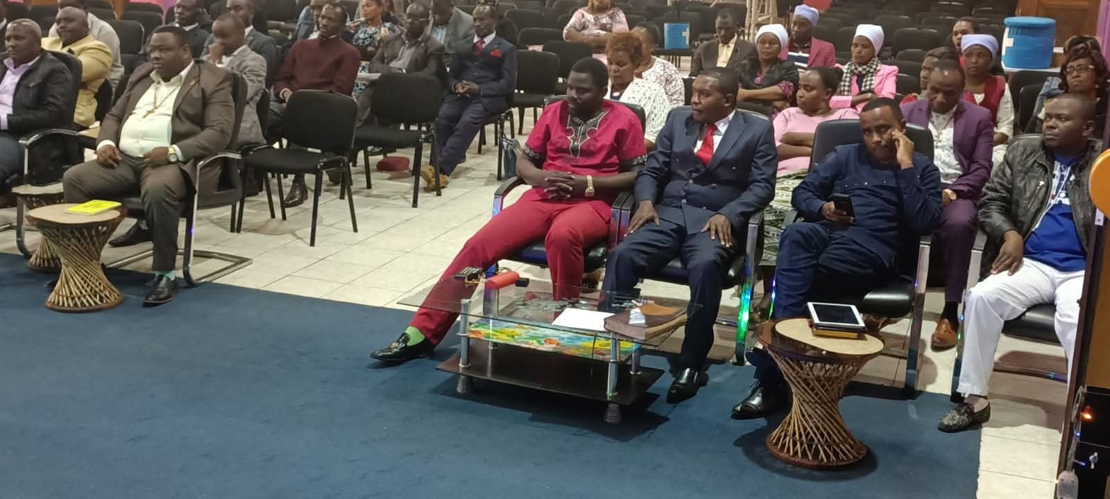 Leaders and a congregation gathered for a partnership meeting